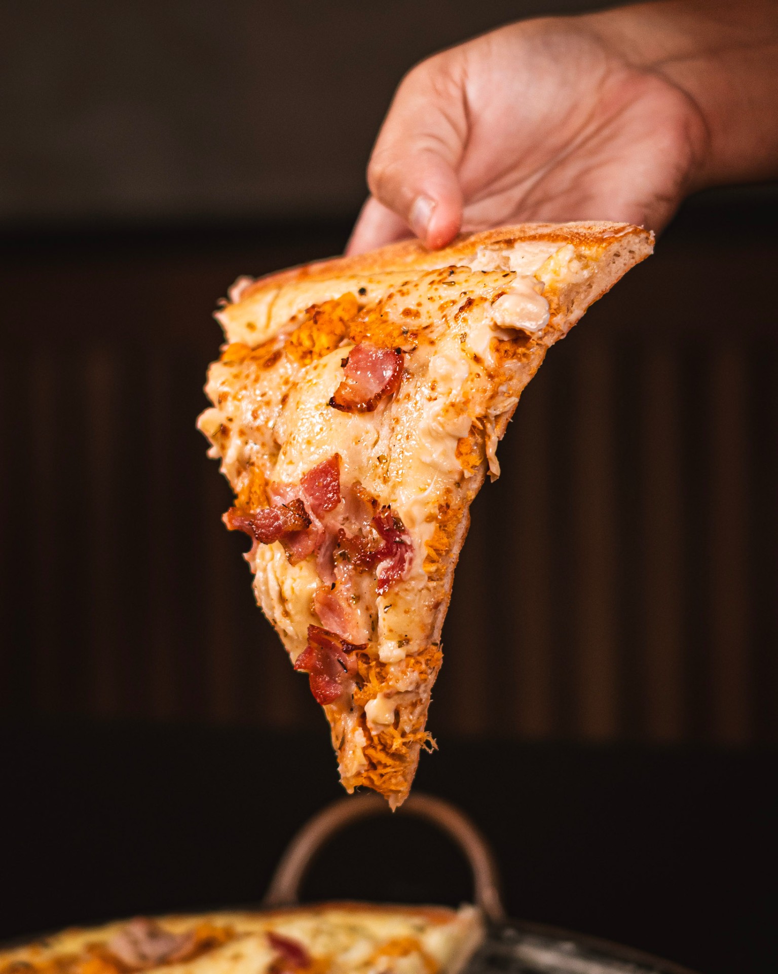 Fatia de pizza com bacon
